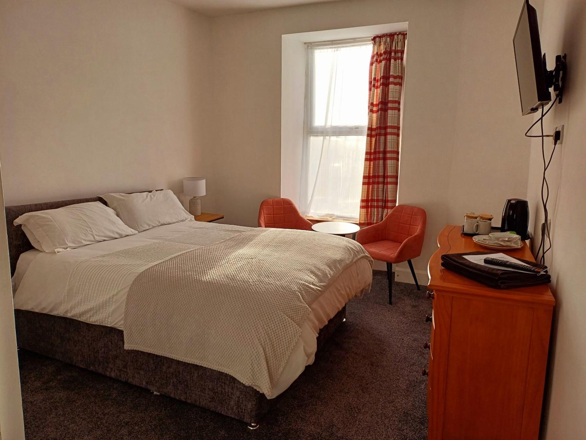 Queens Rooms بورثمادوج الغرفة الصورة